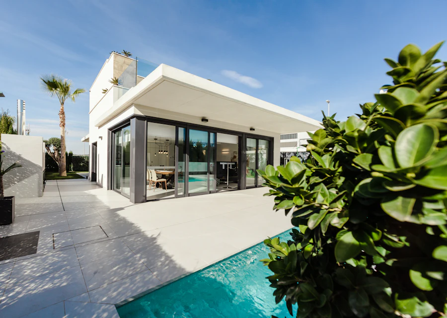 A modern white house with a pool